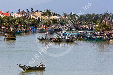 Boats on the Thu Bon River at Hoi An, Vietnam.