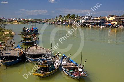 Boats on the Thu Bon River at Hoi An, Vietnam.