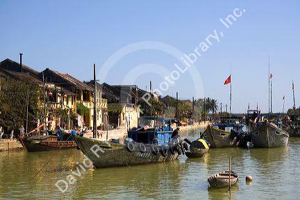 Boats on the Thu Bon River at Hoi An, Vietnam.