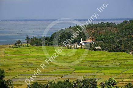 Catholic church and rice paddies south of Hue, Vietnam.