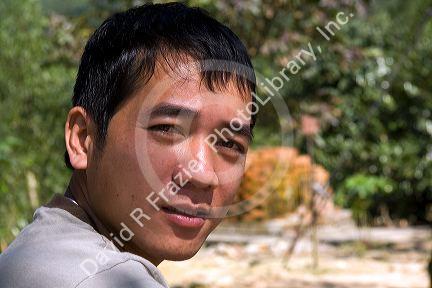 Portrait of a Vietnamese tour guide south of Hue, Vietnam.