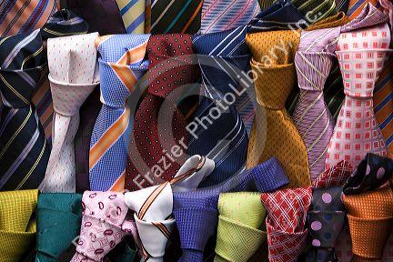 Silk necktie vendor on the street in Hanoi, Vietnam.