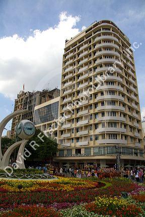 The Palace Hotel and flower displays for Tet Lunar New Year along Nguyen Hue in Ho Chi Minh City, Vietnam.