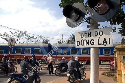 Train crossing signal north of Hue, Vietnam.