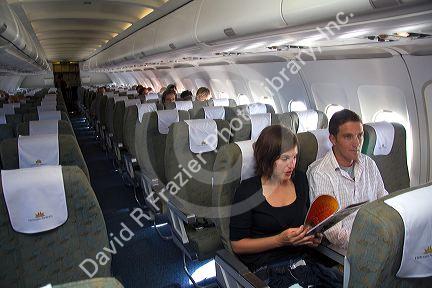 Passengers in flight on a Vietnamese airliner.