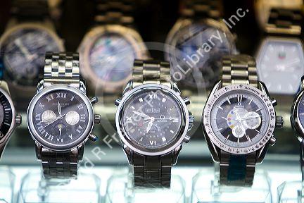 Store window display of watches in Ho Chi Minh City, Vietnam.
