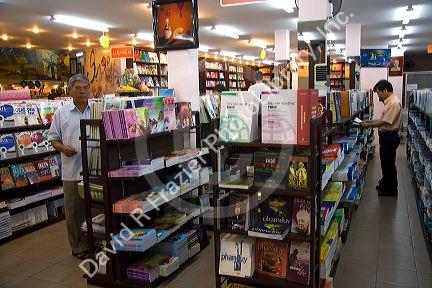 Vietnamese people shopping in a bookstore in Ho Chi Minh City, Vietnam.