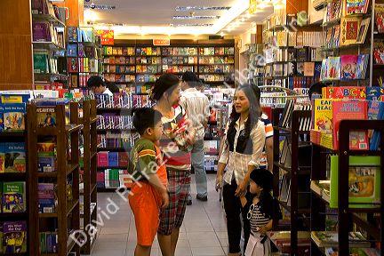 Vietnamese people shopping in a bookstore in Ho Chi Minh City, Vietnam.