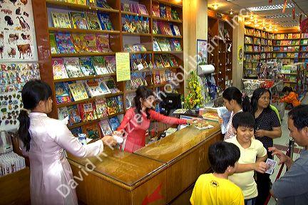 Vietnamese people shopping in a bookstore in Ho Chi Minh City, Vietnam.