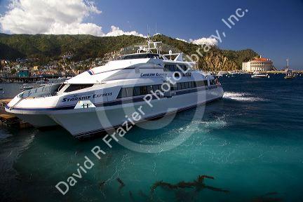Jet engine catamaran ferry boat docked at the town of Avalon on Catalina Island, California, USA.