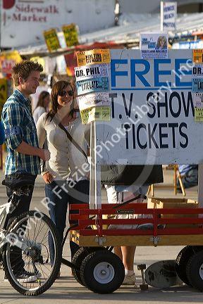 People and boardwalk retail space at Venice Beach, Los Angeles, California.