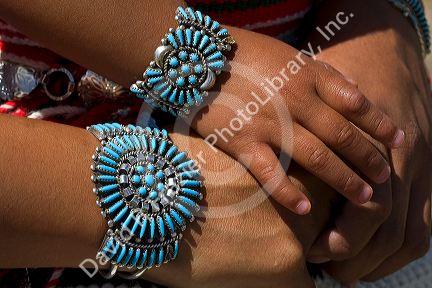 Turquoise bracelets crafted and worn by a Navajo Indian mother and daughter from Arizona, USA. MR