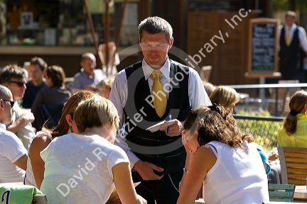 Outdoor restaurant at the Tuileries Garden near the Lourve in Paris, France.