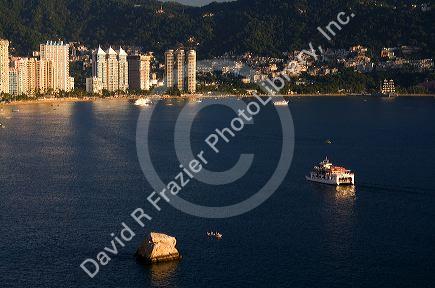 Acapulco Bay lined with hotels in Acapulco, Guerrero, Mexico.
