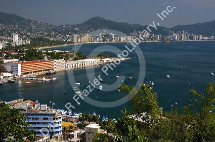 Acapulco Bay lined with hotels in Acapulco, Guerrero, Mexico.