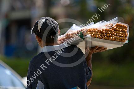 Street vendor selling churros in Acapulco, Guerrero, Mexico.