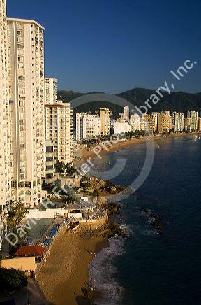 Acapulco Bay lined with hotels in Acapulco, Guerrero, Mexico.