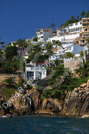 Cliffside housing along the bay at Acapulco, Guerrero, Mexico.