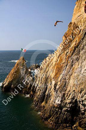 The La Quebrada Cliff Divers perform for the public from the cliffs of La Quebrada in Acapulco, Guerrero, Mexico.
