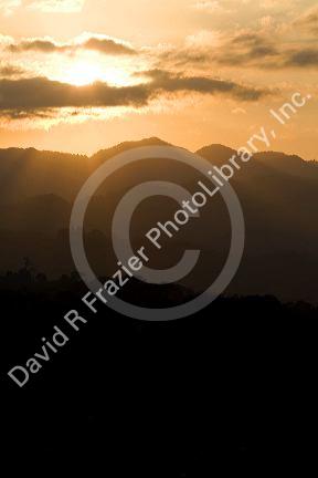Sunset over the Cordillera Central from the Arenal Volcano National Park near La Fortuna, San Carlos, Costa Rica.