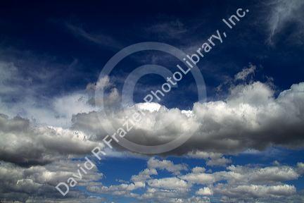 Cumulus and cirrus clouds with blue sky over Idaho, USA.