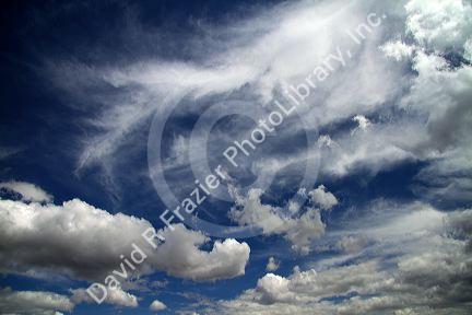 Cumulus and cirrus clouds with blue sky over Idaho, USA.