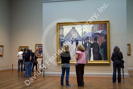 Paris Street; Rainy Day painting by Gustave Caillebotte displayed at the Art Institute of Chicago, Illinois, USA.