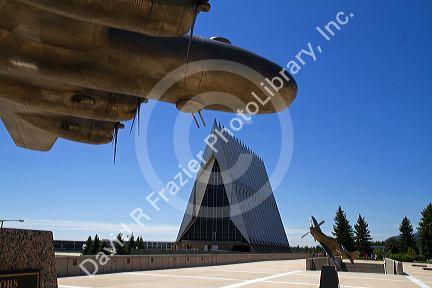 Bronze sculpure of vintage WW11 aircraft in front of the Cadet Chapel at the Air Force Academy in Colorado Springs, Colorado, USA.