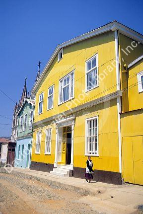 A yellow house in Valparaiso, Chile.