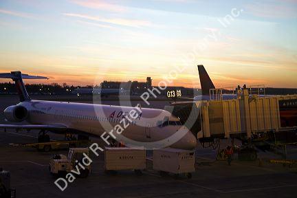 Delta airliner during sunset at the Minneapolis-Saint Paul International Airport located in Fort Snelling, Minnesota, USA.