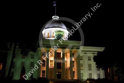 The Alabama State Capitol Building at night located on Goat Hill in Montgomery, Alabama, USA.