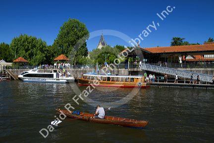 Vintage mohogany motorboat on the Parana Delta at Tigre, Argentina.