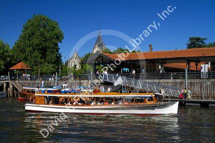 Vintage mohogany motorboat on the Parana Delta at Tigre, Argentina.