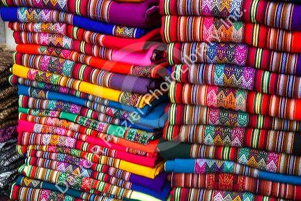 Textiles being sold at a market in Lima, Peru.