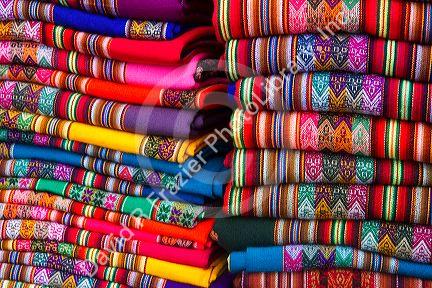Textiles being sold at a market in Lima, Peru.