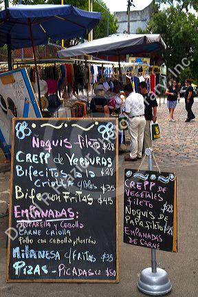 Menu board of a restaurant in the La Boca barrio of Buenos Aires, Argentina.
