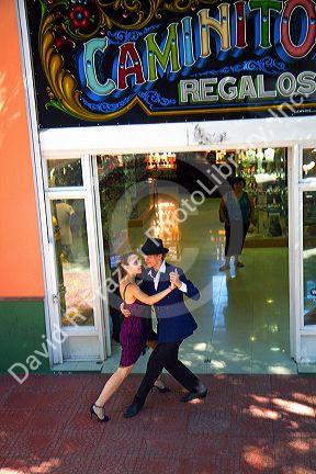 Argentine tango dancers in the La Boca barrio of Buenos Aires, Argentina.