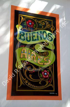Colorful signage on a building in the La Boca barrio of Buenos Aires, Argentina.