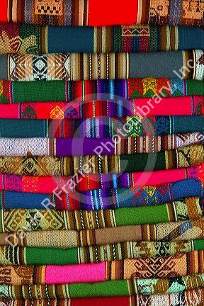 Textiles being sold at a market in Lima, Peru.