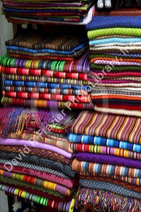 Textiles being sold at a market in Lima, Peru.