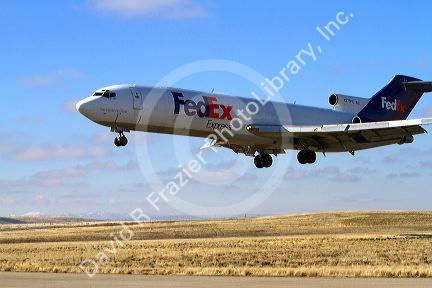 FedEx Boeing 727 cargo plane landing at the Boise Airport, Idaho, USA.