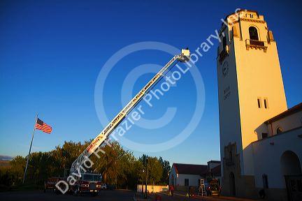 Firetruck testing 100 foot aerial ladder at the Boise Union Pacific Depot in Boise, Idaho, USA.