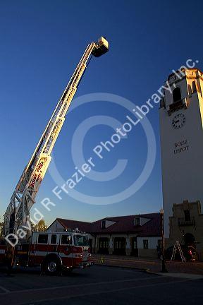 Firetruck testing 100 foot aerial ladder at the Boise Union Pacific Depot in Boise, Idaho, USA.