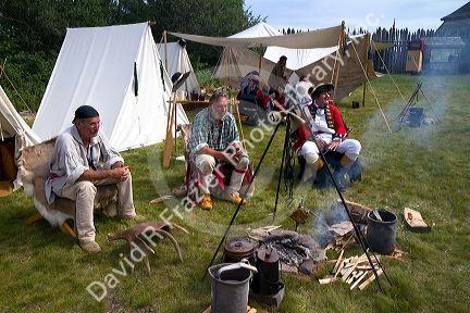 People participate in a rendezvous re-enactment at the Grand Portage National Monument on the north shore of Lake Superior in northeastern Minnesota, USA.