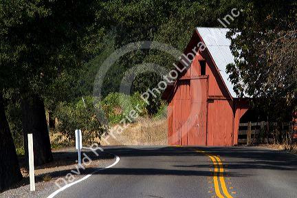 Red barn along Highway 128 near Geyserville, California, USA.