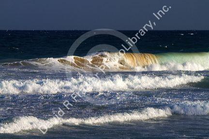 Pacific ocean waves off the island coast of Kauai, Hawaii, USA.