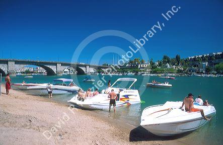 Pleasure boats gather at the London Bridge in Lake Havasu, Arizona.