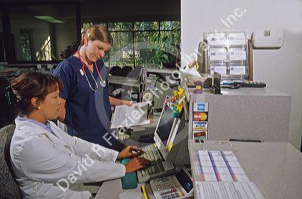 Medical business staff in a doctor's office.  MR