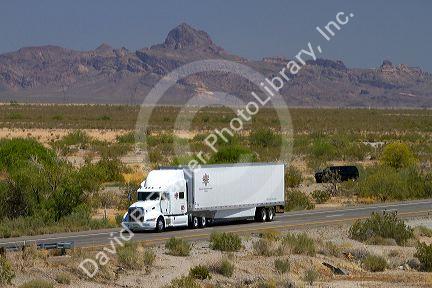 Freight transport truck traveling on Interstate 10 near Tucson, Arizona, USA.