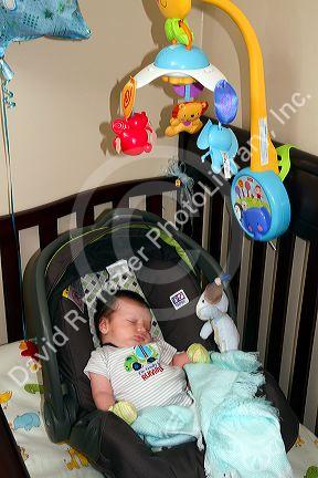 Newborn baby in a car seat, Boise, Idaho, USA. MR
